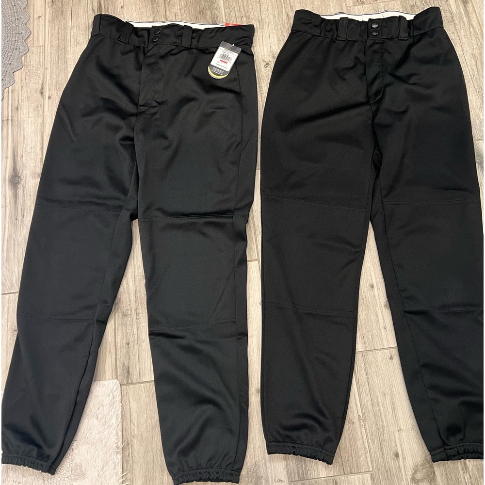 2 Wilson baseball pants. Size medium. Black 1 nwt 1 used